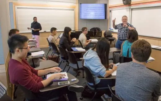 a group of people in a classroom