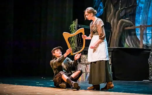a man and a woman on a stage
