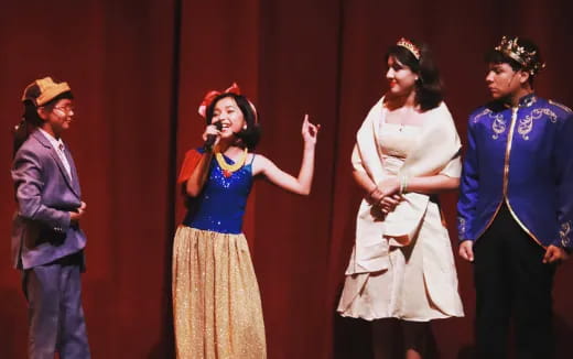 a group of people on a stage