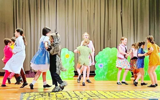 a group of children dancing