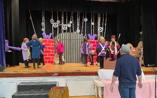 a group of children on a stage
