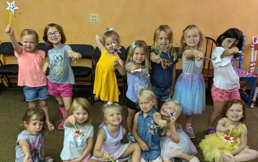 a group of children posing for a photo