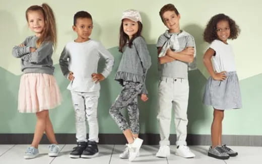 a group of children in matching outfits