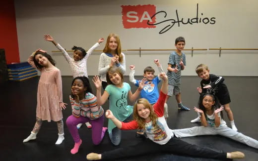 a group of children posing for a photo