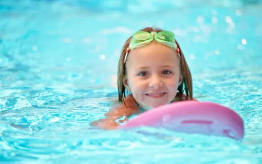 a girl in a pool