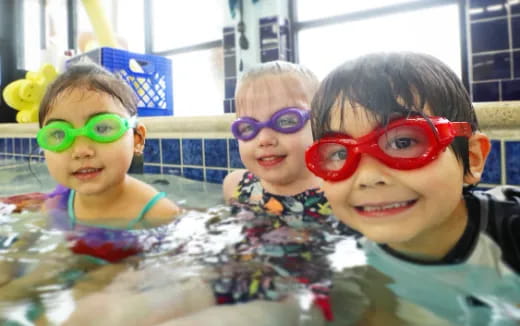 a group of kids wearing goggles