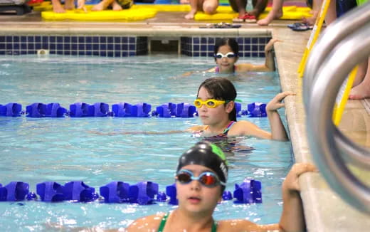 a group of people in a pool