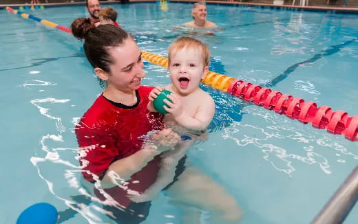 a group of kids in a pool