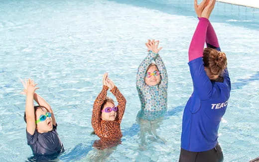 a group of people in the water
