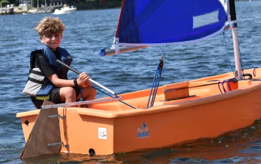 a boy in a boat
