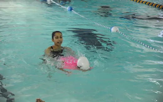 a woman in a pool