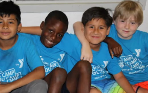 a group of boys posing for a photo
