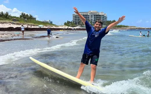 a person surfing on the waves
