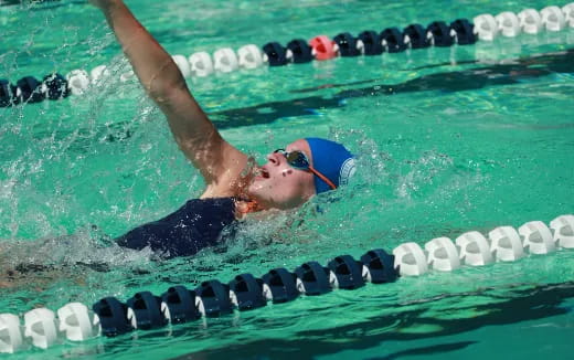 a person swimming in a pool