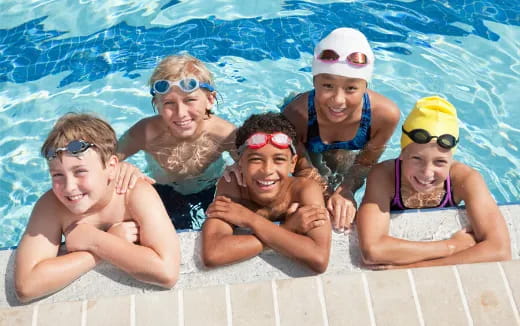 a group of people in a pool