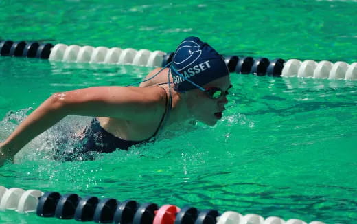 a person swimming in a pool