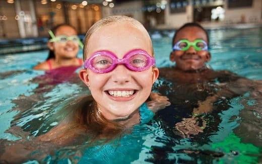 a group of people in a pool