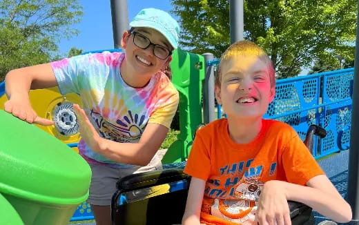 a person and a boy on a ride