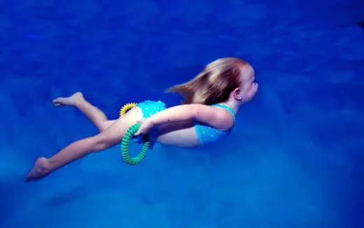 a person floating in the water