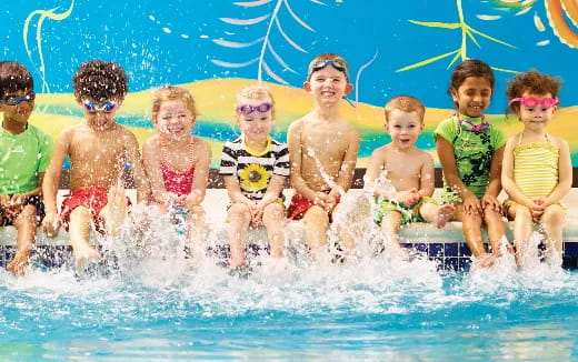 a group of kids in a pool