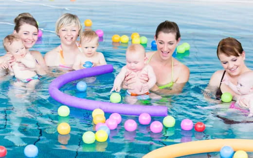 a group of people in a pool