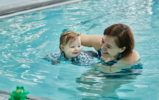 a man and a woman in a pool