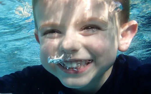 a person with a water drop on the nose