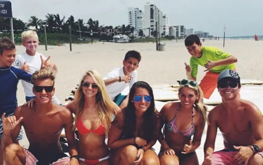 a group of people on a beach