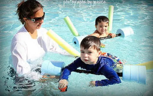 a group of people in a pool