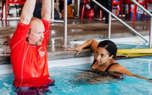 a man and a woman in a pool