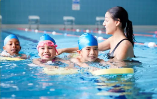 a group of people in a pool