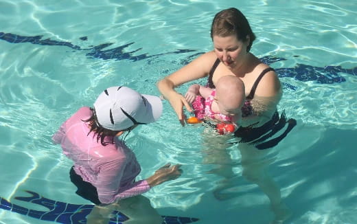 a person and a child in the water