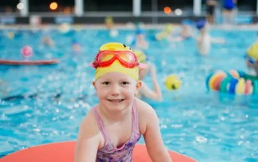 a girl in a pool