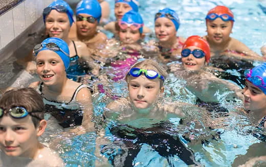 a group of people in a pool