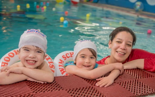 a group of kids in a pool