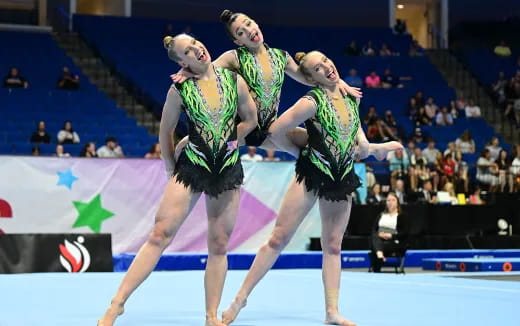 a group of women dancing on a stage