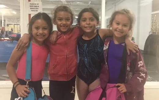 a group of girls posing for a photo