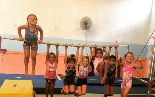 a group of children posing for a photo