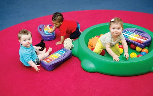 a group of kids playing in a ball pit