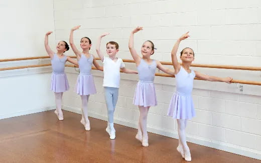 a group of girls in dresses