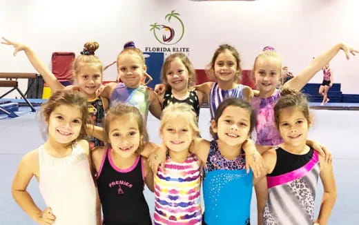 a group of girls posing for a photo