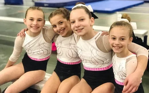 a group of girls posing for a photo