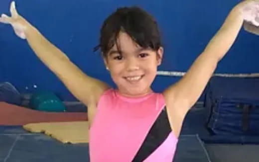 a person with the arms raised