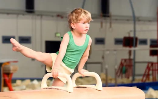 a child sitting on a table