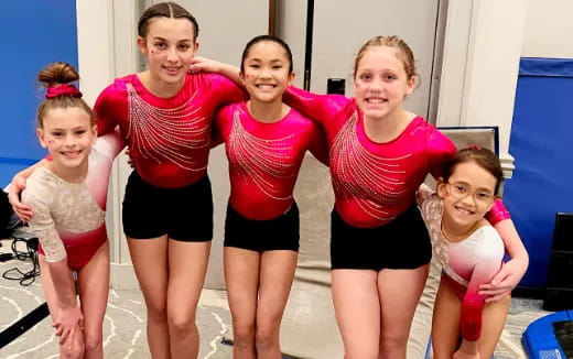 a group of girls in a gym