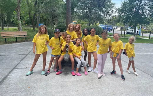 a group of people wearing matching t-shirts