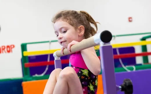 a child sitting on a toy