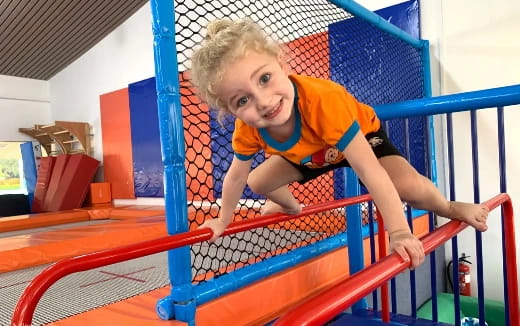 a boy on a playground toy