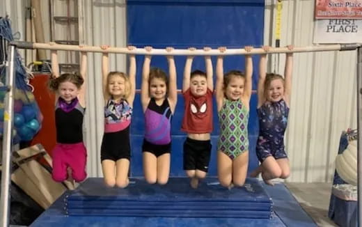 a group of children posing for a photo