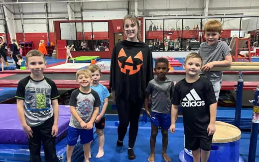 a group of kids posing for a photo